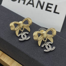 18K CC Bow Tie Gold Earrings