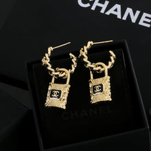 18K CHANEL Lock Earrings