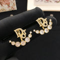 18K CD Seven Diamond Star Earrings