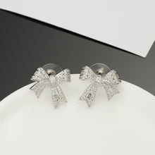18K CC Bow Tie Diamond Earrings