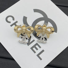 18K CC Bow Tie Gold Earrings