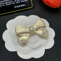 18K CC Bow Tie Gold Brooch