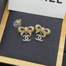 18K CC Bow Tie Gold Earrings