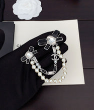 18K CC Black Bow Pearls Brooch