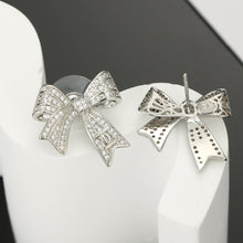18K CC Bow Tie Diamond Earrings