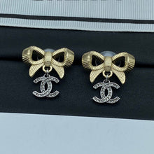 18K CC Bow Tie Gold Earrings