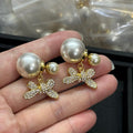 18K CD Bow Diamond Gold Earrings