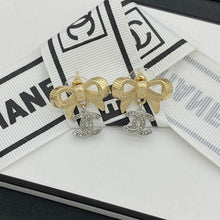 18K CC Bow Tie Gold Earrings