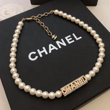 18K CHANEL Scripe Pearls Necklace