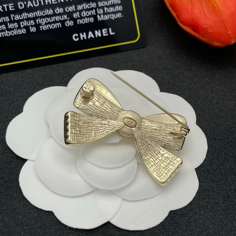 18K CC Bow Tie Gold Brooch