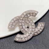 18K CC Diamonds Brooch