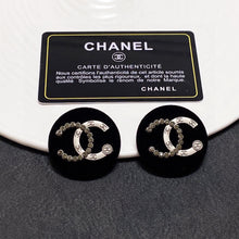 18k CHANEL Black Resin Circle Earrings