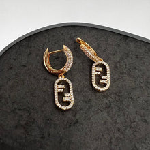 18K F O’Lock Earrings