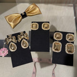 18K CC 25K Golden Bow Earrings