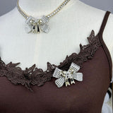 18K CC 25K Bow Tie Diamond Brooch