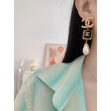 18K CC Long Pearl Pendant Earrings