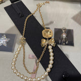 18K CC 25K Butterfly Pearl Necklace